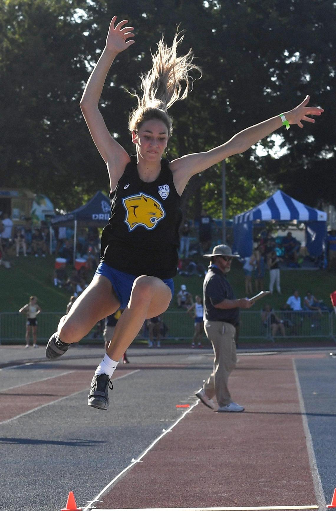 Clovis High’s Sydnie Vanek soars during the Girls Long Jump, during the CIF Central Section Masters Track and Field 2021 Championships at Buchanan High, Saturday June 19.