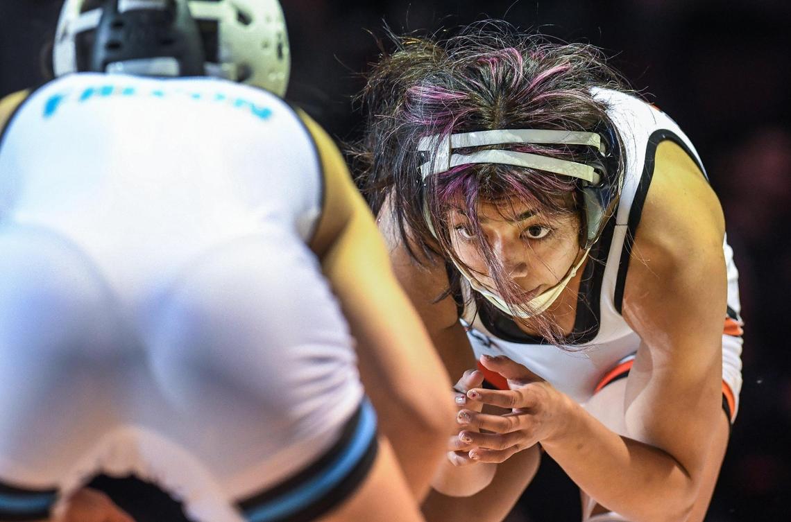 Central’s Paige Morales, right, wrestles Anaya Falcon of Walnut in the girls 106-pound CIF State Wrestling Championship match at Mechanics Bank Arena in Bakersfield on Saturday, Feb. 25, 2023. Morales lost the bout and finished second overall.