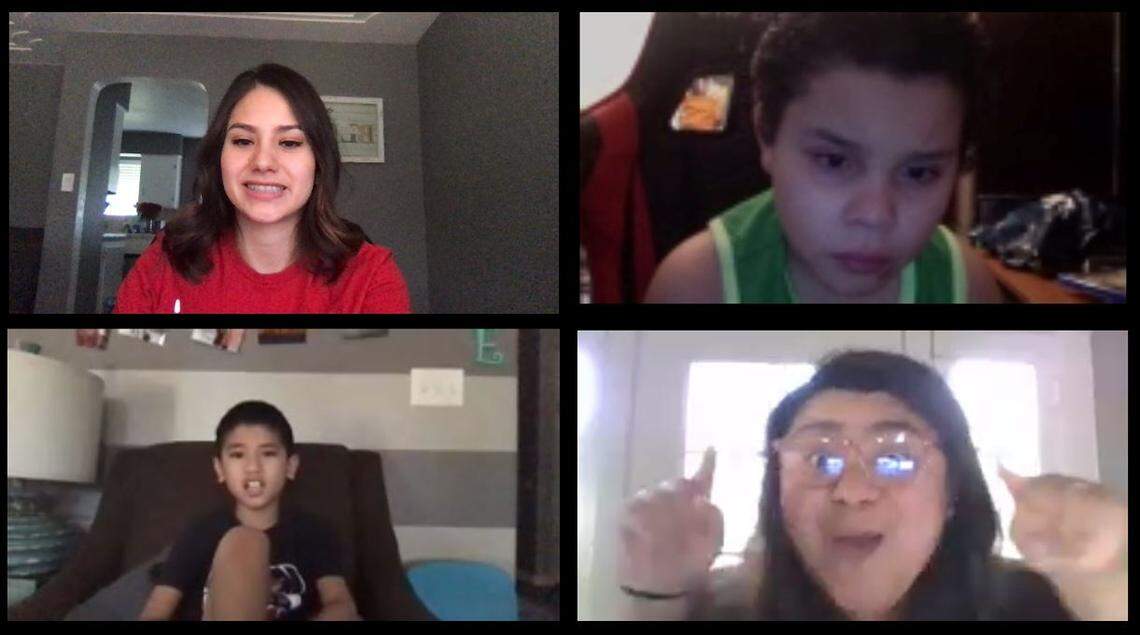 Monse Yanez, Robert Guiterrez, and Nathaniel Valadez join a video class with their teacher Kelly Castillo, who teaches at Susan B. Anthony Elementary School, while schools were closed to help slow the spread of coronavirus.