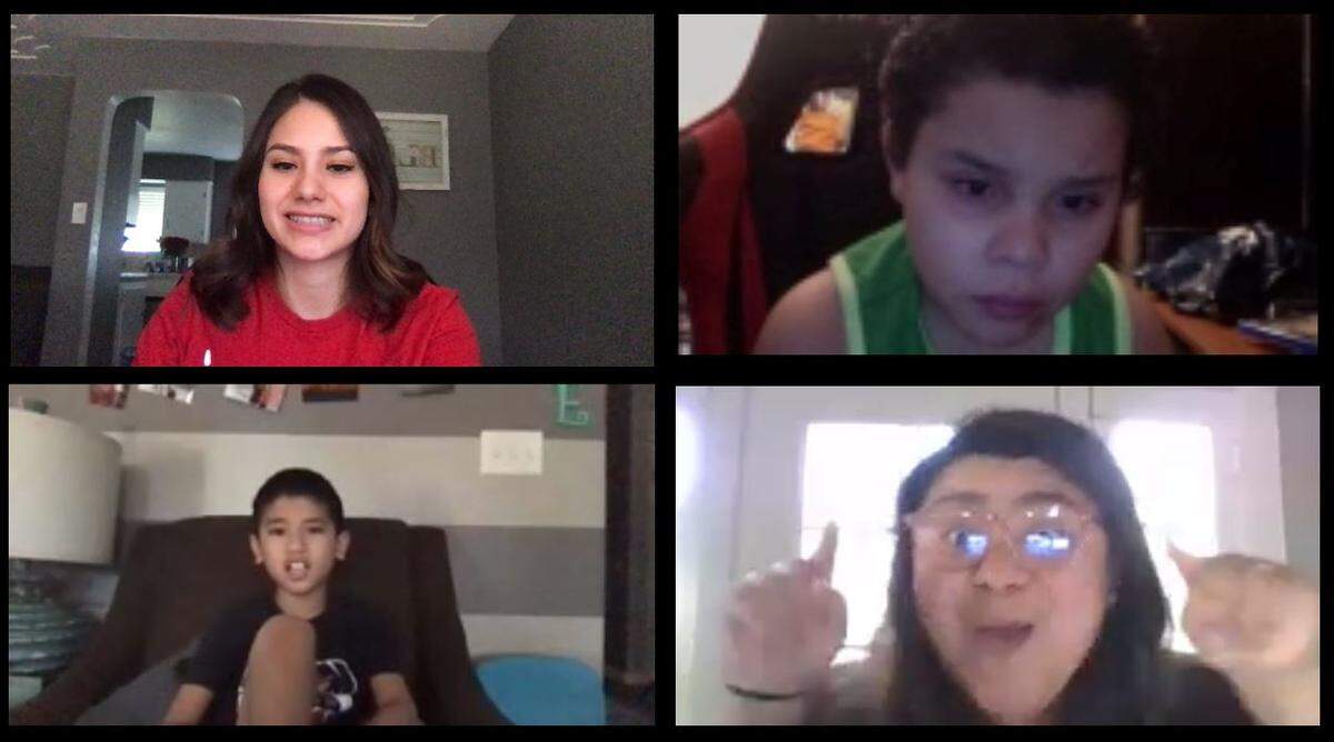 Monse Yanez, Robert Guiterrez, and Nathaniel Valadez join a video class with their teacher Kelly Castillo, who teaches at Susan B. Anthony Elementary School, while schools were closed to help slow the spread of coronavirus.
