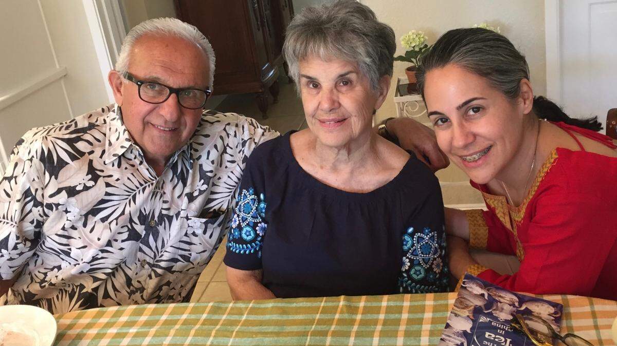 Ed and Janet Marashian in their Fresno home with their daughter Julianne Burk.