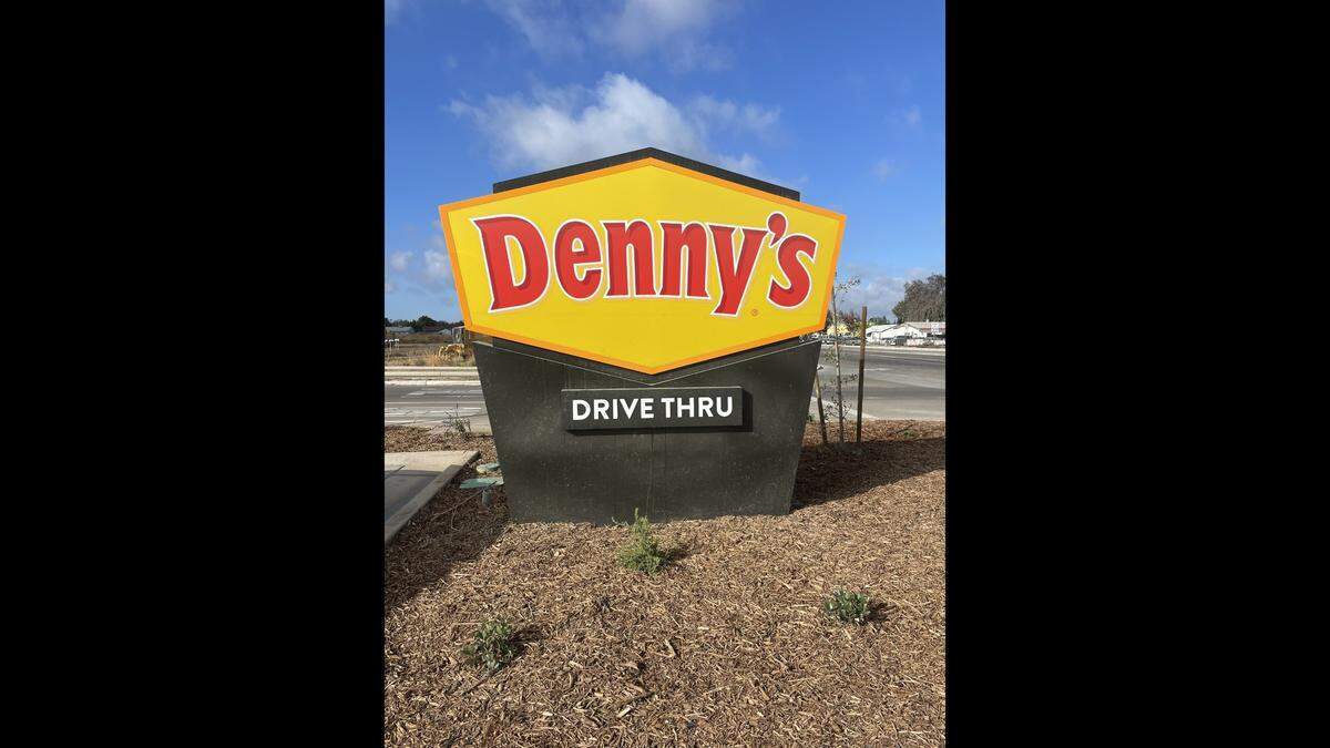 The first Denny’s with a drive-thru has opened in California. It’s in Kerman in Fresno County.
