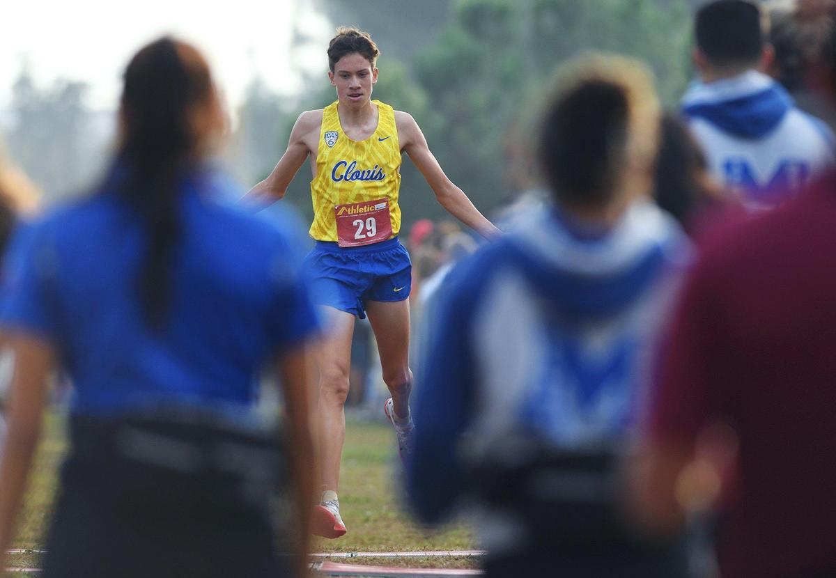 Clovis High’s Christopher Caudillo places first at the Central Section Boys DI cross country chamionship held at Woodward Park Thursday, Nov. 18, 2021 in Fresno.