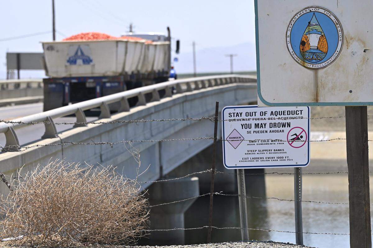 A truck crosses the California's Aqueduct near Three Rocks Monday, Aug. 11, 2025.