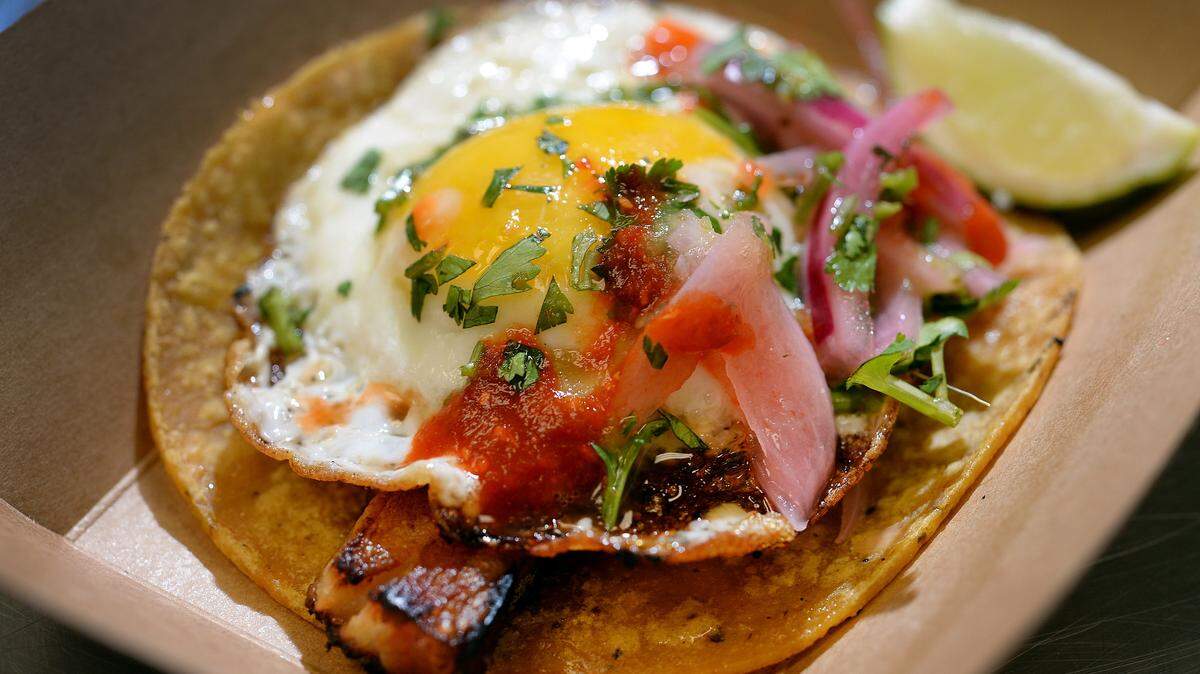 A ranchero taco made with braised pork belly and a Pitman Farms fried egg on top at Taste Kitchen in the Sunnyside area of Fresno on Wednesday, Jan. 17, 2018