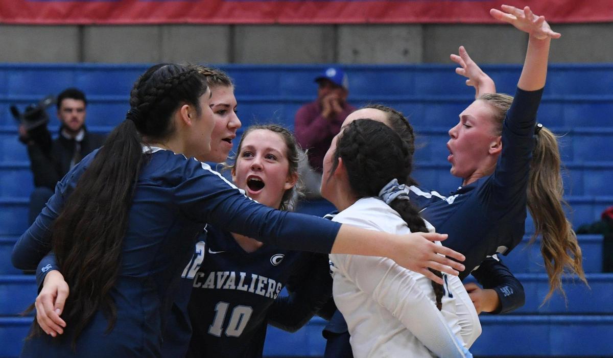 Central Valley Christian celebrates a point against Buchanan in the Central Section’s Division II girls volleyball championship Thursday, Nov. 3, 2022 in Clovis.