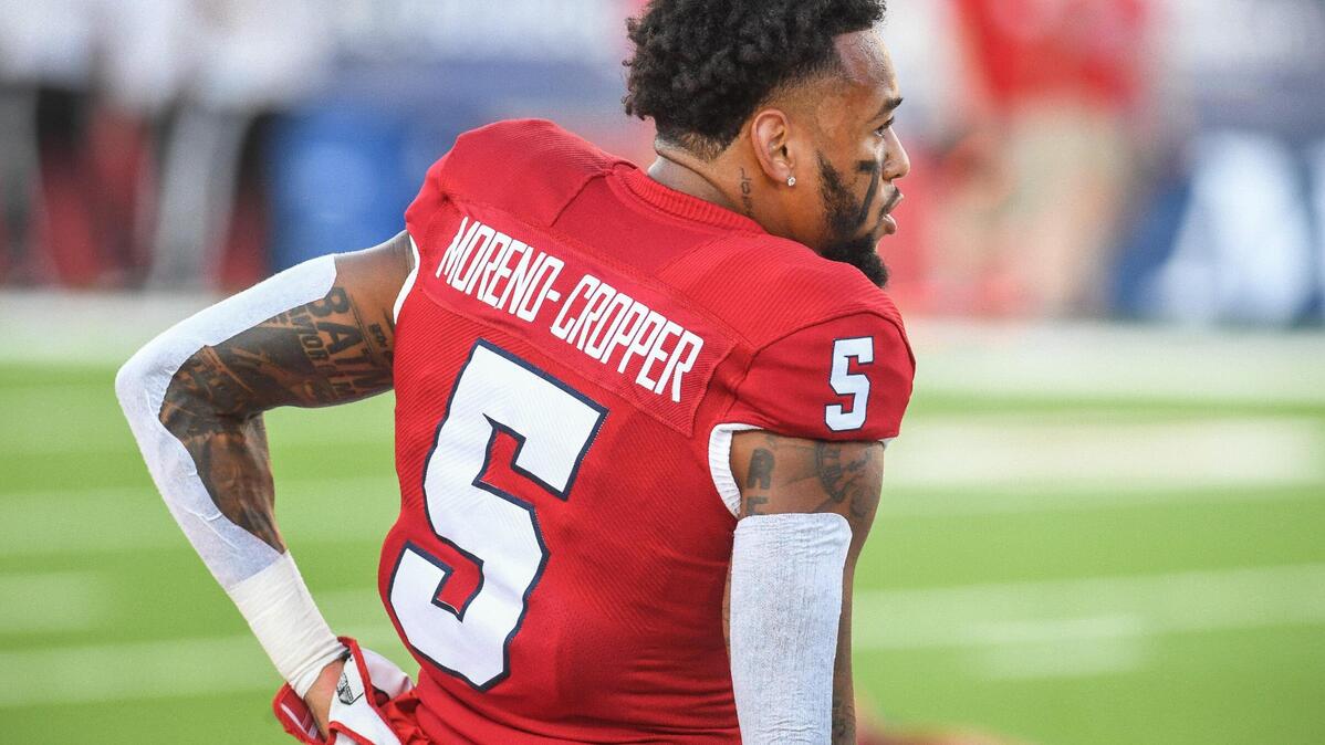 Jalen Moreno-Cropper warms up in a jersey with his new name on it before the start of the Fresno State-Cal Poly game at Valley Children’s Stadium on Thursday, Sept. 1, 2022.