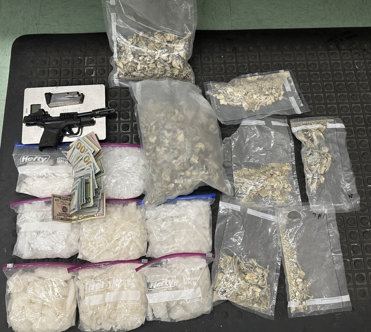 David Mitchell of Fresno was pulled over while having an unsecured dog on a motorcycle on Wednesday, Oct. 12, 2022. Deputies later found a gun and drugs that includes seven pounds of packaged meth and one pound of packaged Psilocybin mushrooms.