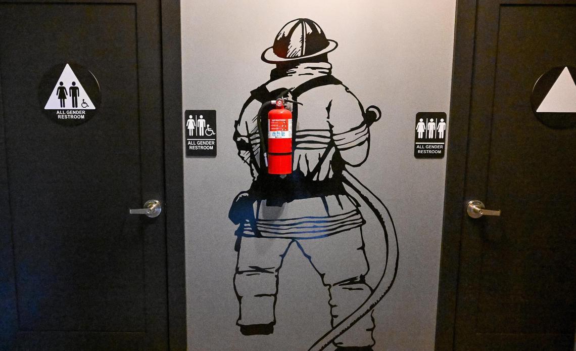 A creative use of the fire extinguisher sits between the restroom doors at Station 48, a beer and wine taproom that is opening inside an old fire station in downtown Fowler.