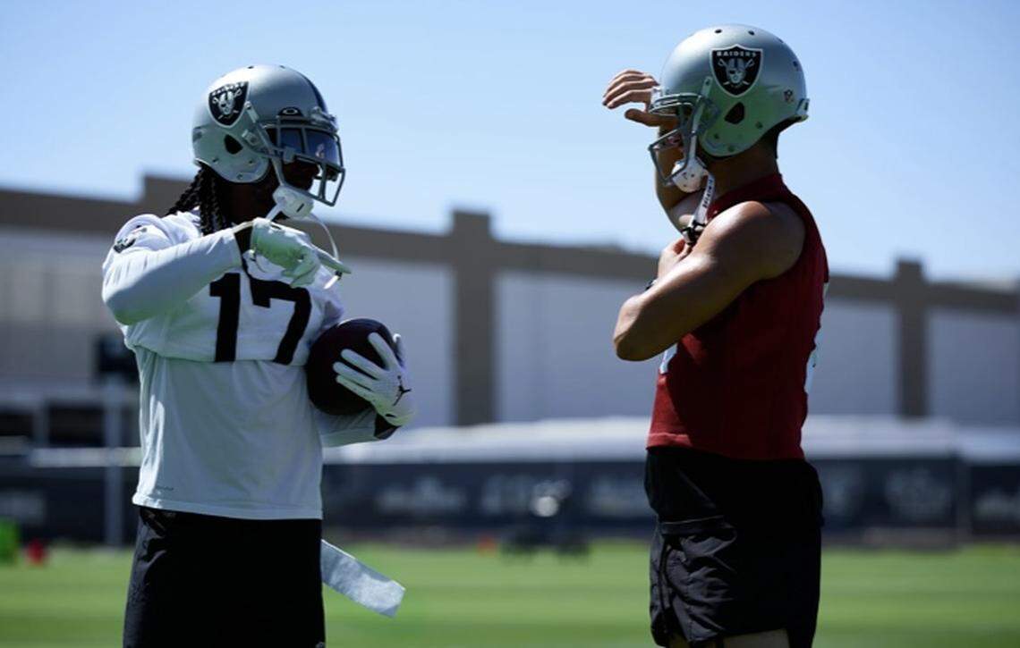 Davante Adams, left and Derek Carr, right at mandatory minicamp in Henderson, Nev., in June.