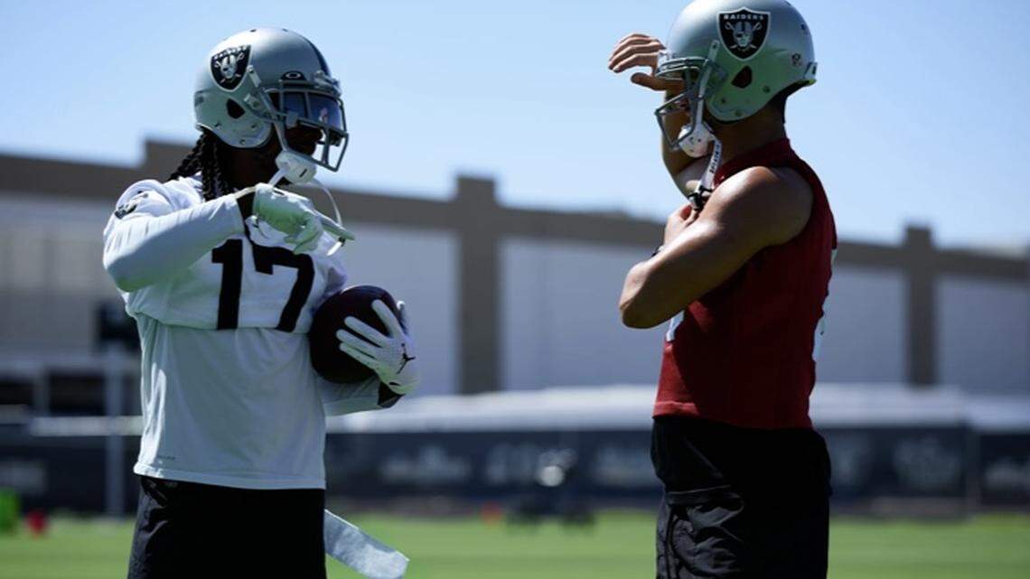 Davante Adams, left and Derek Carr, right at mandatory minicamp in Henderson, Nev., in June.
