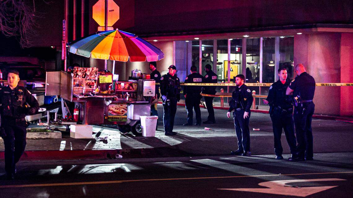 Officers investigate a shooting outside a nightclub that left four people injured on Sunday, Jan. 9, 2022. Fresno police on Thursday reported a suspect has been arrested.