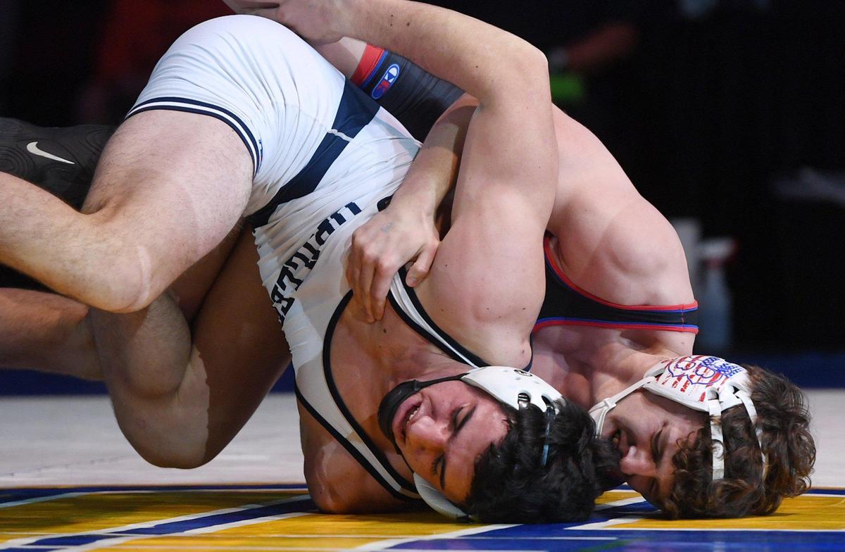 Bakersfield’s Tye Monteiro, foreground, with Buchanan’s Joseph Martin, bacground, in the 182 lb bout at the CIF state wrestling championships held Sarurday, Feb. 26, 2022 in Bakerfield.