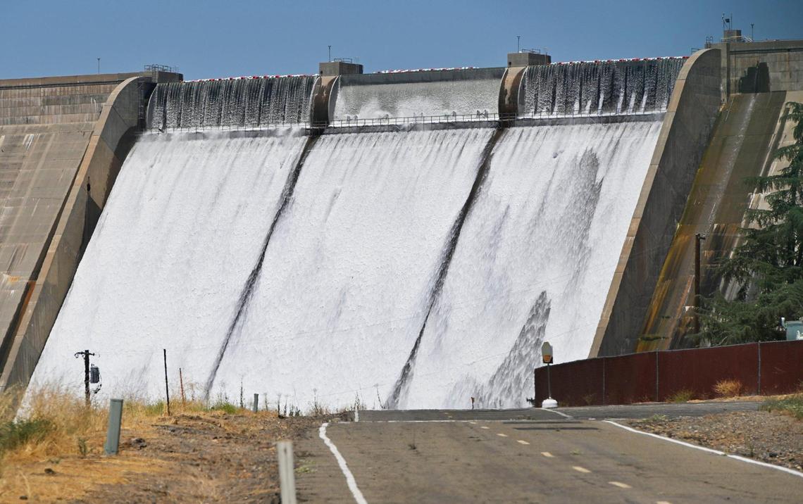 Friant Dam releases water from Millerton Lake into the San Joaquin River Saturday afternoon, July 15, 2023 near Friant.