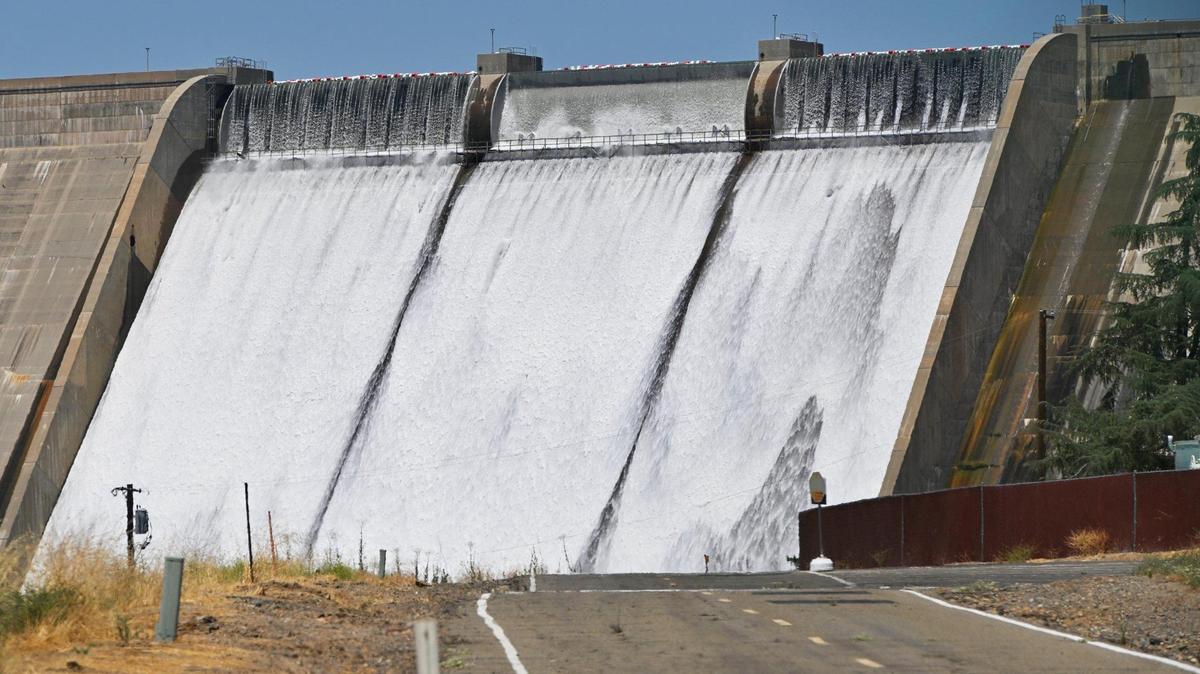 Friant Dam releases water from Millerton Lake into the San Joaquin River Saturday afternoon, July 15, 2023 near Friant.