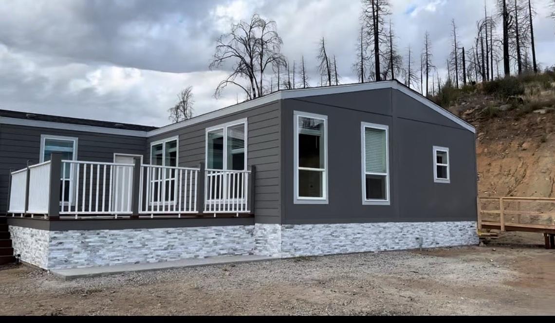 Photo of the Clayton family’s fabricated home completed in 2024. The family’s Pine Ridge area cabin, built in 1990, was destroyed in the 2020 Creek Fire.