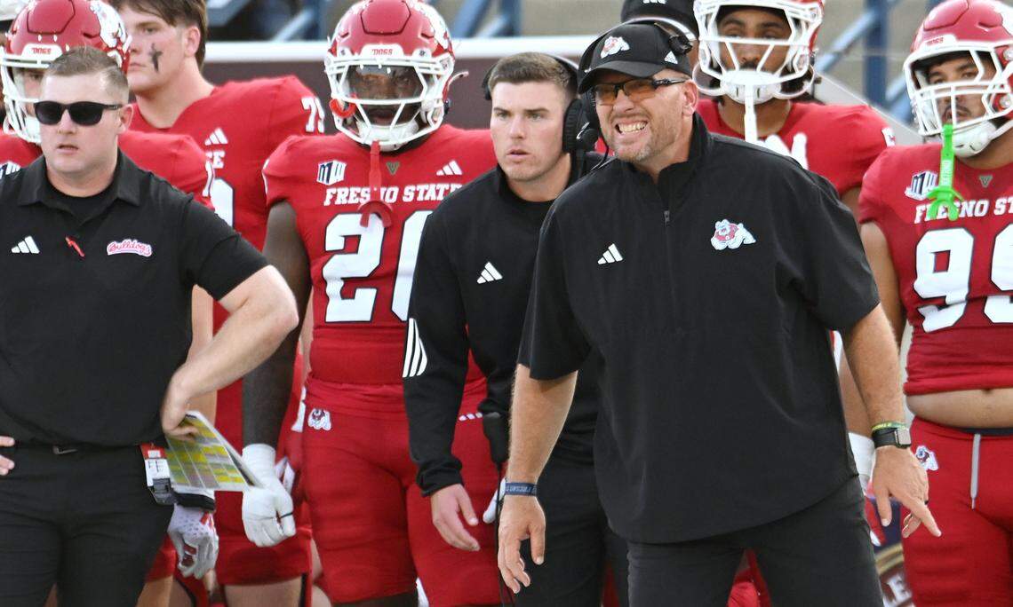 Fresno State head coach Matt Entz, right, grimaces during the game against Georgia Southern Saturday, Aug. 30, 2025 in Fresno.