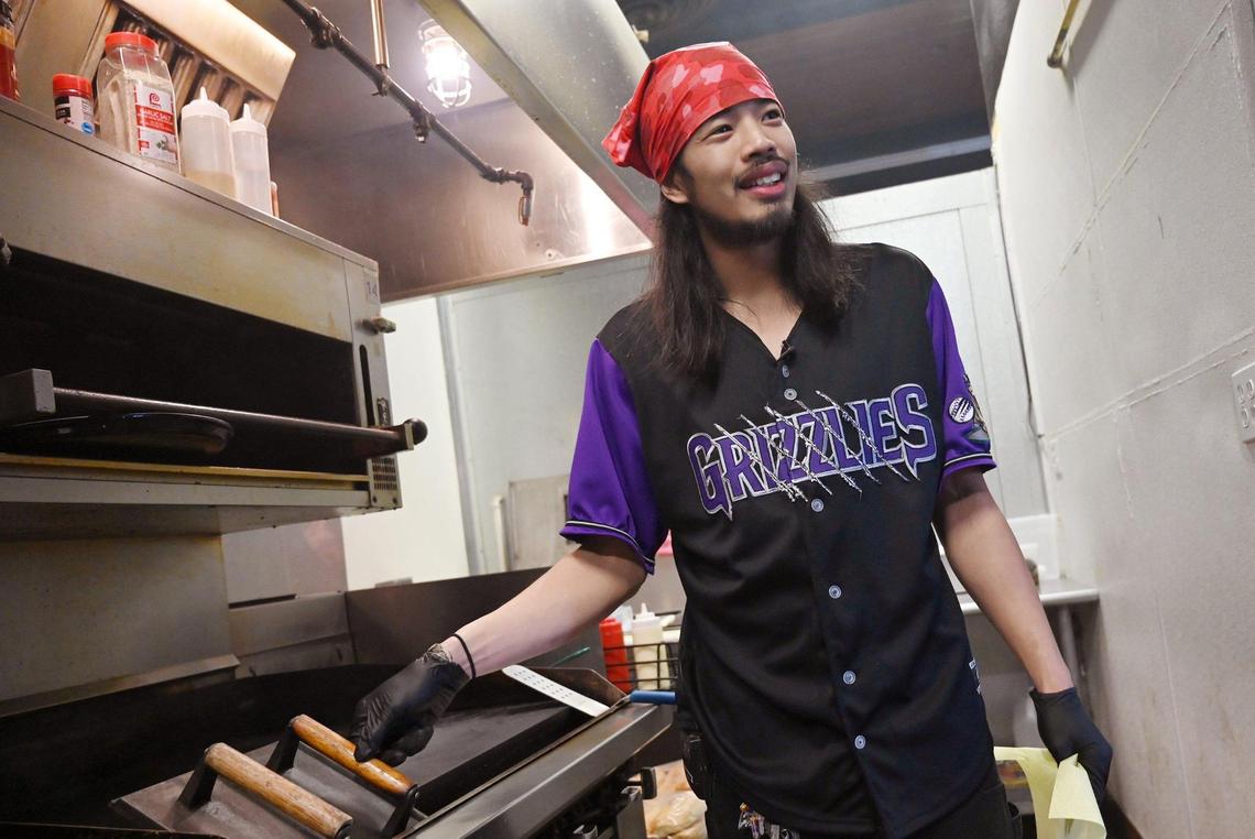 Eddie Wutangsy, shown at the grill, has opened My Guy Market, a ghost kitchen along Belmont Avenue just north of downtown that purposes itself as an online app-driven bodega for customers, offering New York City-inspired food and more. Photographed Friday, Jan. 20, 2023 in Fresno.