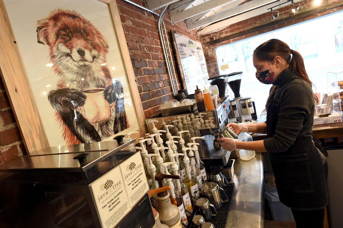 Jesse Knox makes a hot drink in the coffee shop of Shep’s Club, the former historic Shepherd’s Inn, Tuesday Jan. 5, 2020. Shep’s Club now hosts different businesses, such as a cafe, deli, farmer’s market, thanks to undercover work by designer Elaine Culotti of the Undercover Billionaire TV show.