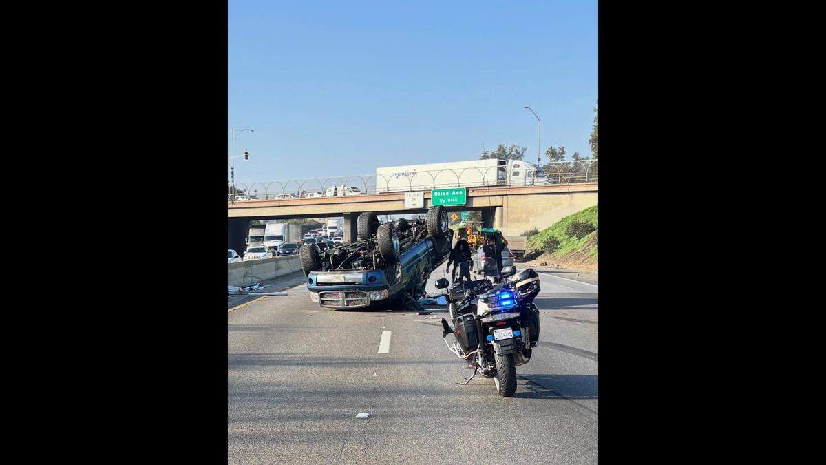 A truck overturned on northbound Highway 99 near Olive Avenue Friday, Jan. 23, 2026, snarling traffic, according to the California Highway Patrol.