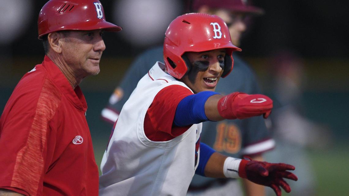Buchanan’s JP Acosta motions to the Buchanan dugout after reaching third base in the third game of a three-game series against Clovis West Friday, May 6, 2022 in Clovis.