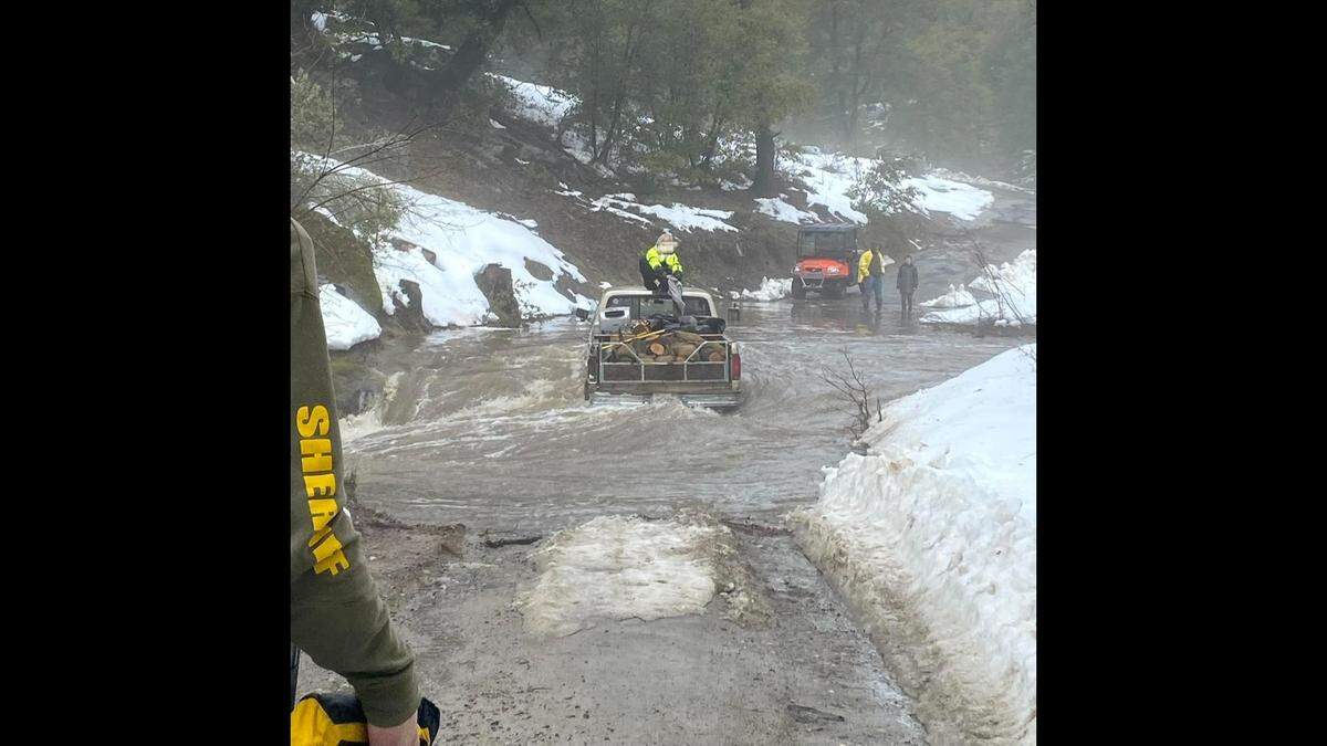 The Madera County Sheriff’s Office rescued a man who was stranded in a vehicle on a flooded roadway on Friday, March 10, 2023.
