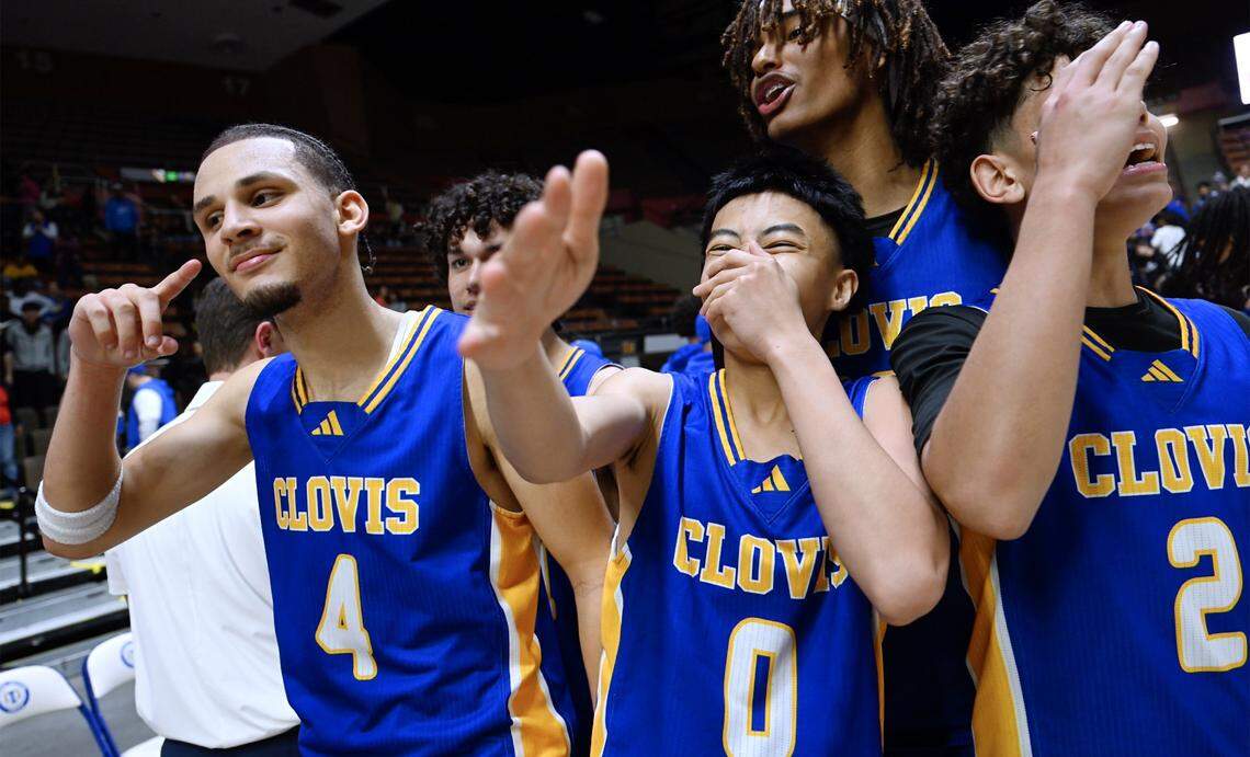 Clovis High celebrates its 68-47 win over Atascadero for the CIF Central Section 2025-2026 DII Boys Basketball Championship held Friday, Feb. 27, 2026 at Selland Arena in Fresno.
