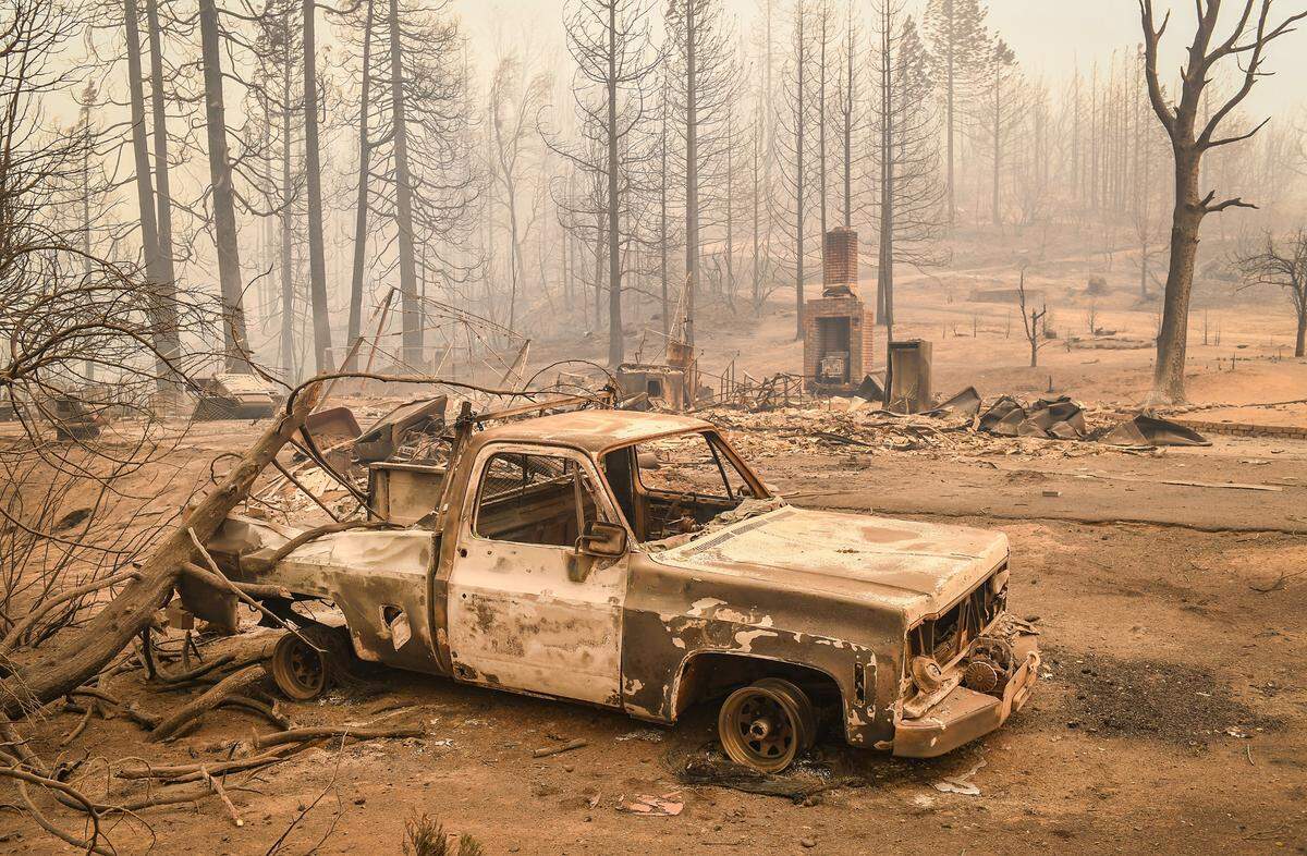 A destroyed home across the street from Pine Ridge School near Highway 168 and west of Shaver Lake is seen after the Creek Fire ravaged the area late Monday.
