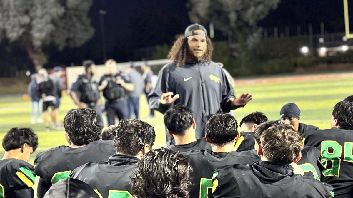 Roosevelt High coach Ricky McCoy talks to his team following a win over Sunnyside on Thursday, Oct. 2, 2025.