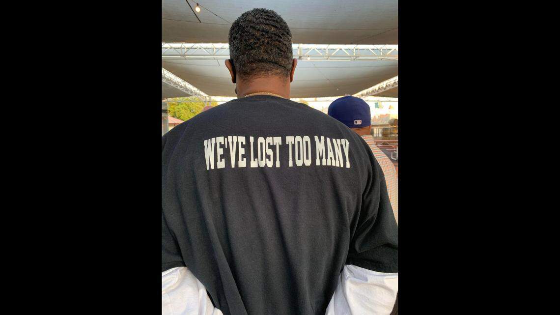A community leader stands to hear one of the youth groups discuss their needs during Wednesdays summit at the Fresno Fairgrounds. Organizations such as Fresno Barrios Unidos, Advance Peace, Fresno EOC, Fresno United and Take a Stand helped facilitate breakout sessions and communications with the youth.