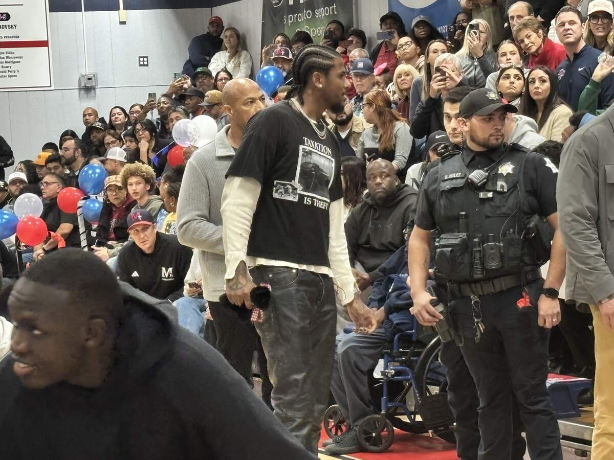 Former San Joaquin Memorial star Jalen Green finds a seat before his No. 4 jersey was retired on Wednesday, Nov. 19, 2025.