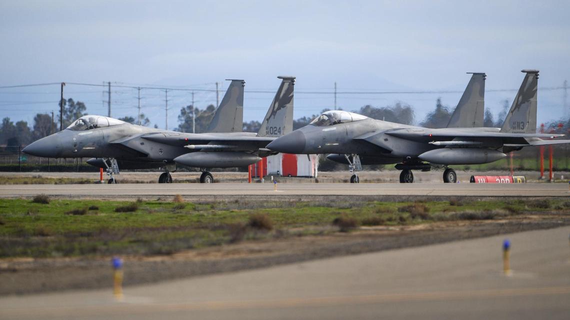 A pair of F-15Cs based at Fresno’s 144th Fighter Wing taxis onto the runway before taking off from Fresno Yosemite International Airport during the Valley Thunder training exercises hosted by Fresno’s 144th Fighter Wing of the Air National Guard on Wednesday, Jan. 3, 2021.
