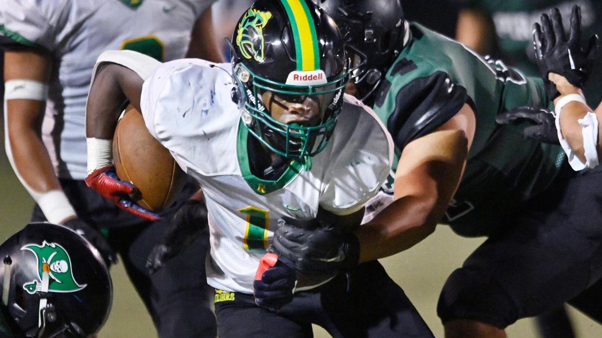 Roosevelt’s Deavion Fields finds a hole in the Reedley defense for yards in Roosevelt’s 39-32 win Friday night, Aug. 25, 2023 in Reedley.