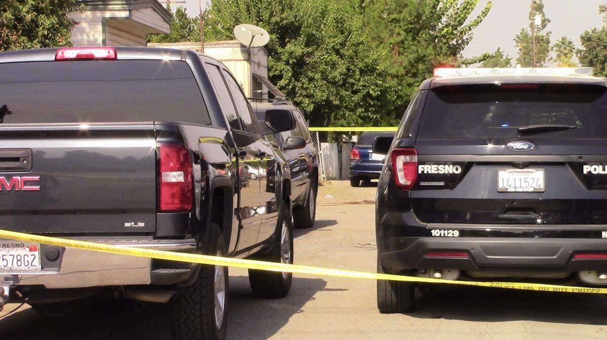 Fresno police investigate a shooting death at a mobile home park in northeast Fresno, California on Saturday, Oct. 24, 2020.