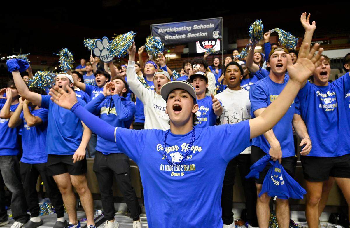 Clovis High fans cheer the remaining overtime game against Clovis West in the CIF Division I Girls Basketball Championship Saturday, March 1, 2025 in Fresno.