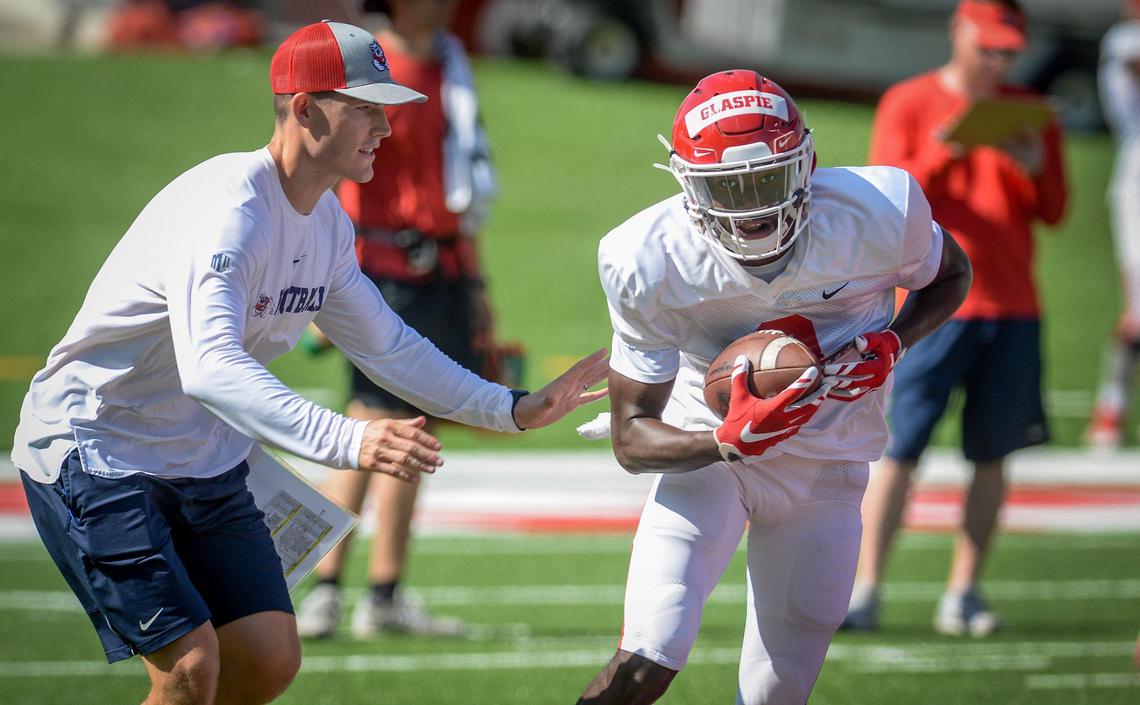 Fresno State wide receiver Jamal Glaspie, right, runs after a catch during drills at fall camp on Saturday, Aug. 10, 2019.