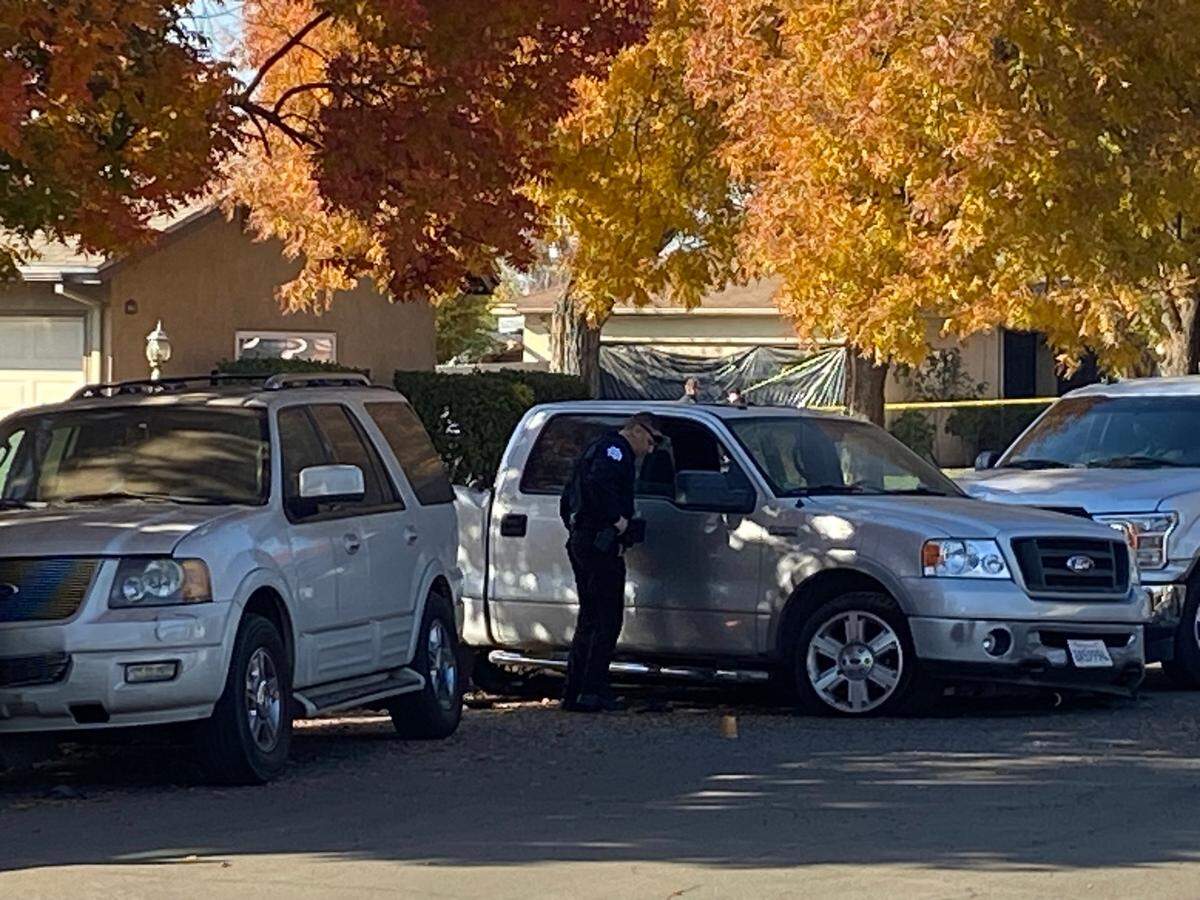 Fresno police investigate a scene after a pursuit that ended in a crash on Michigan near Bond avenues on Tuesday, Nov. 22, 2022.