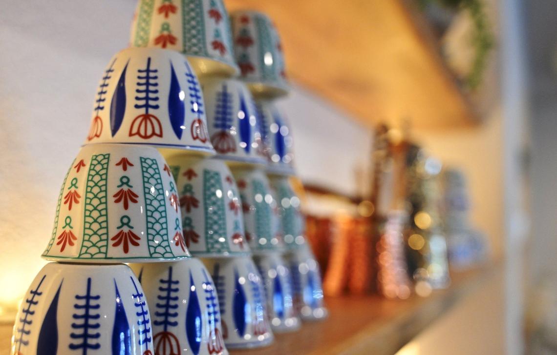 Small coffee cups are stacked at Zaatar Bistro in Fresno.