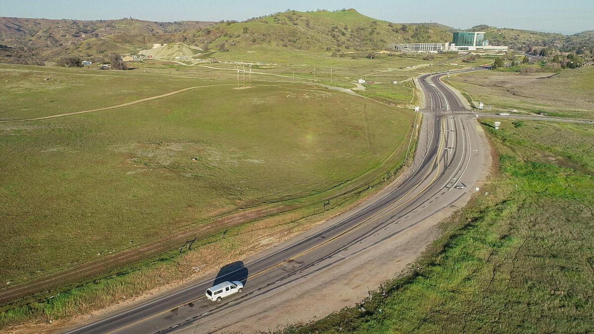 Millerton Road, just west of the new Table Mountain Hotel and Casino project, shows where the widened section of the road narrows to two lanes just as it hits a curve before continuing on into Friant.