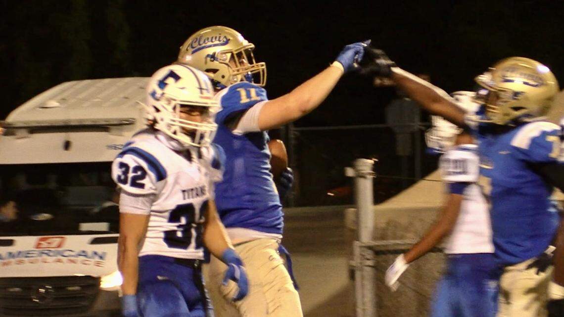 Syrus Mendes, left, celebrates his touchdown with Dezjour Malone on Friday, Sept. 6, 2024.