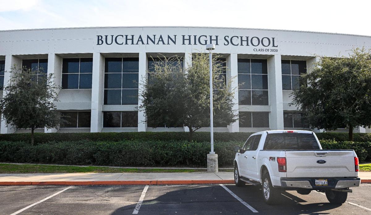 A sign covers the top of a building at Buchanan High School photographed on Tuesday, Feb. 18, 2025.