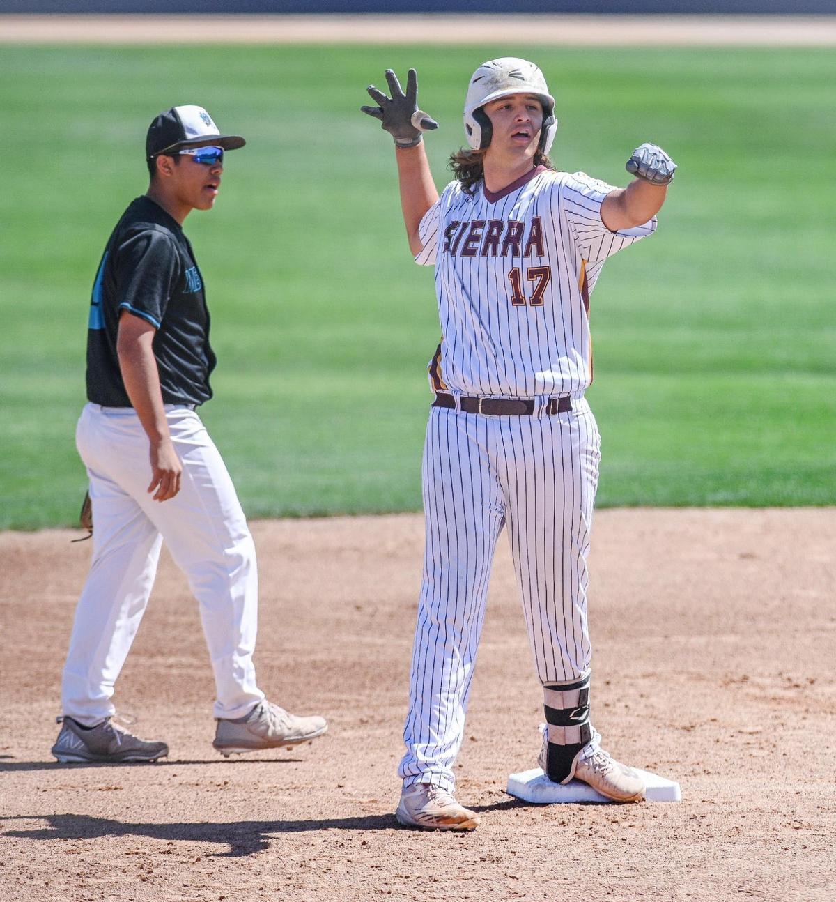 Sierra’s Noah Mitchell gestures toward his team’s dugout after hitting an RBI double in the first inning against Mendota during their Central Section Division VI baseball championship game at Pete Beiden Field on Saturday, May 28, 2022.