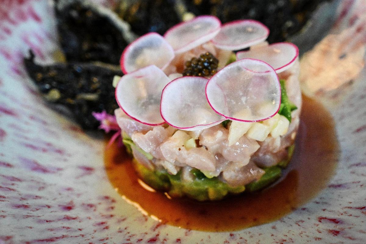 Hamachi ceviche is served with tempura nori chips at O-iza Japanese Cuisine in the River Park shopping center.