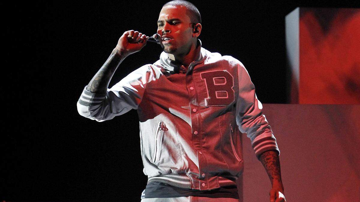 In this Feb. 12, 2012 file photo, Chris Brown performs during the 54th annual Grammy Awards, in Los Angeles.