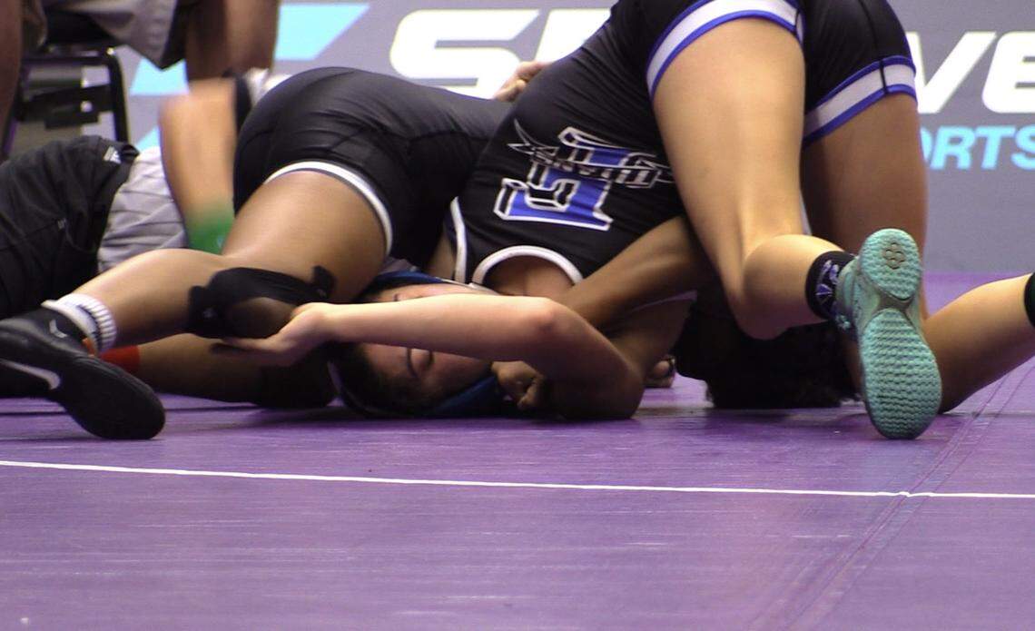 Me’Kala James of Central won by fall over Aubree Kooren of Frontier in 122 pounds at the Central Section Masters at Selland Arena in Fresno, California on Saturday, Feb. 17, 2024.