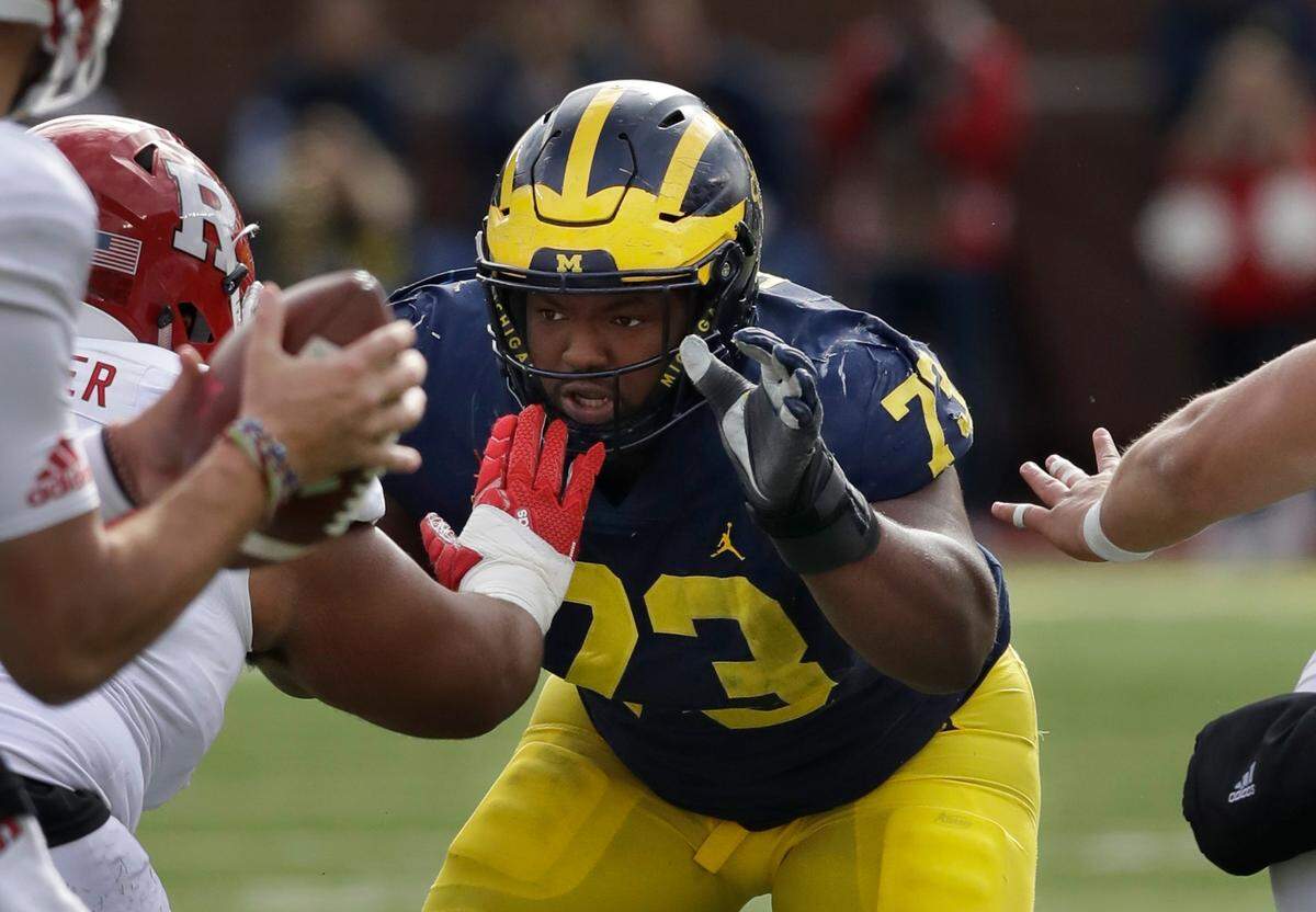 FILE - In this Oct. 28, 2017 file photo Michigan defensive lineman Maurice Hurst (73) goes up against the Rutgers line during the first half of an NCAA college football game in Ann Arbor, Mich.