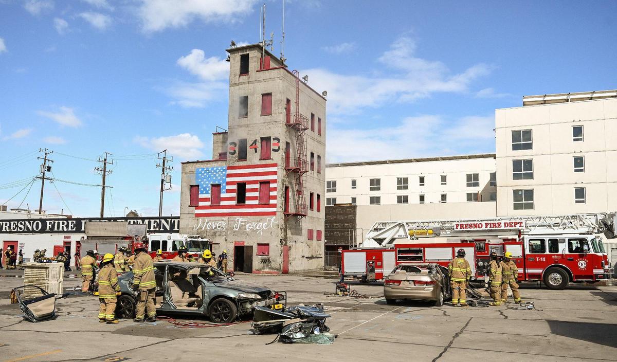 Various drills take place at the Fresno Fire Department’s training grounds in downtown Fresno during their annual “Firefighter for a Day” event where citizens can get an inside look at the job of a firefighter, on Saturday, Oct. 22, 2022.
