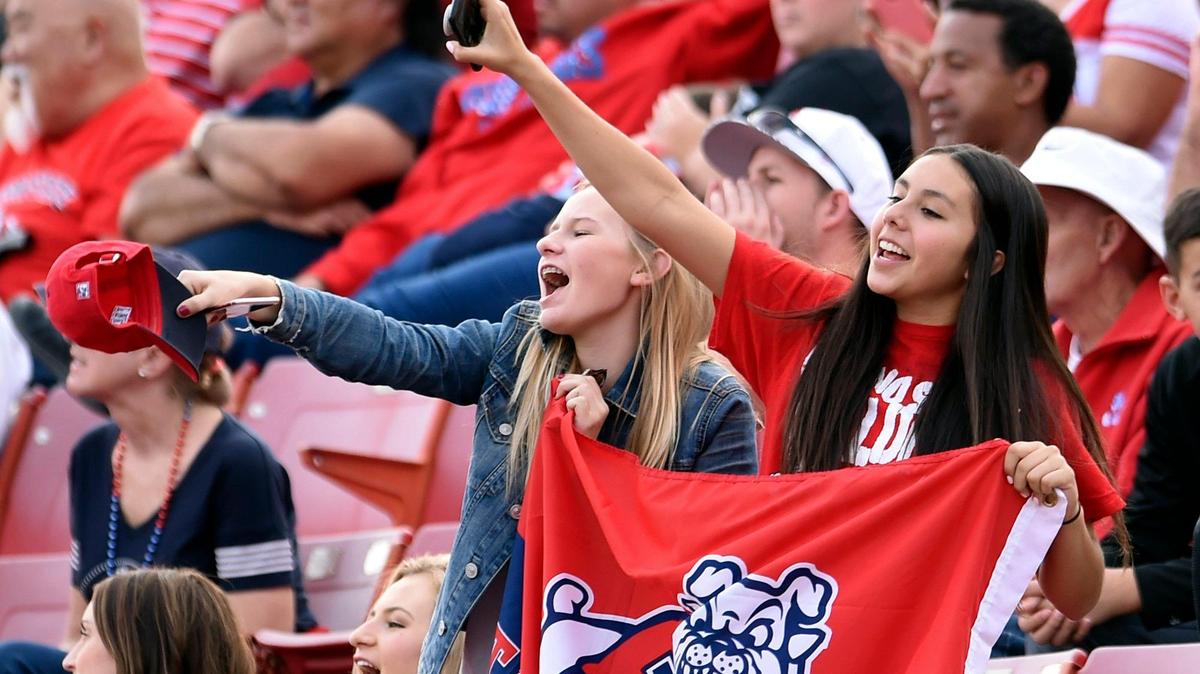 Fans cheer on Fresno State in a 28-17 victory over Boise State in 2017 at Bulldog Stadium. The Bulldogs did not get a chance to play in front of their fans in 2020 due to the coronavirus pandemic.