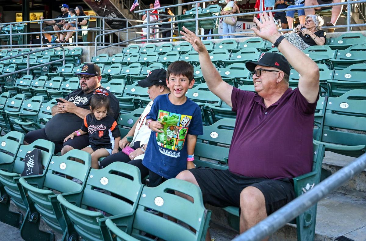Baseball fans enjoy a Fresno Grizzlies game as they take on the Modesto Nuts at Chukchansi Park in downtown Fresno on Wednesday, June 11, 2025.