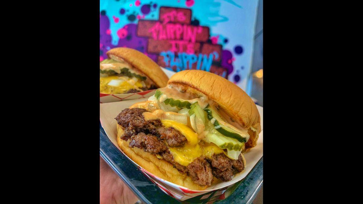 Burgers like this one will be on the menu at Flippin’ Dave’s restaurant when it opens next week in Fresno. 